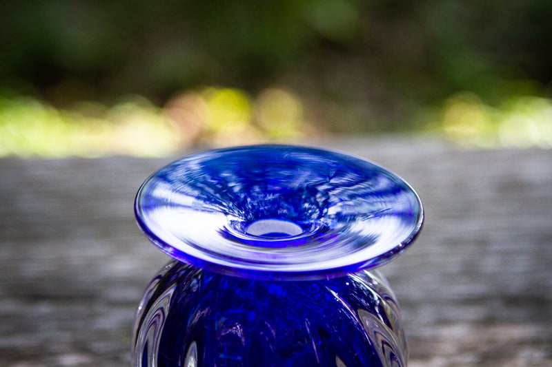 glass urn with ash